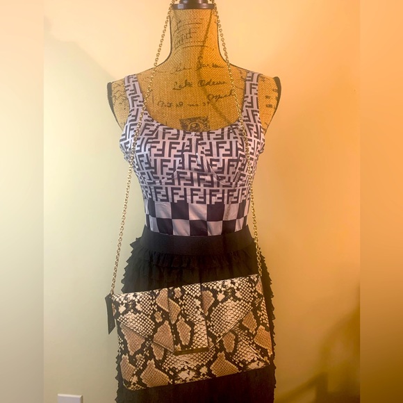 Peach Faux Snake Skin crossbody bag with gold accent chain. - Picture 2 of 4